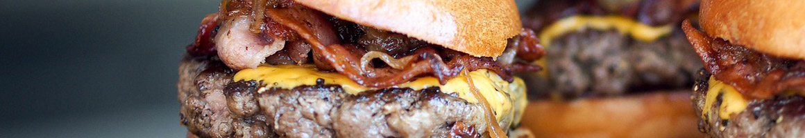 Eating Burger at Tom's Junior Burger restaurant in Los Angeles, CA.